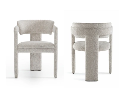 Sedia Iris in tessuto imbottito di Pacini e Cappellini